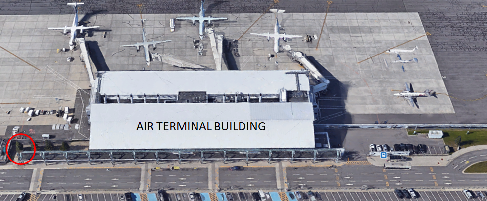 Aerial view of Thunder Bay Airport indicating the exterior service relief area in red at the south end of the building